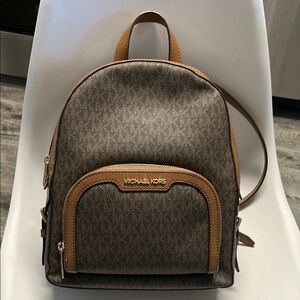Michael Kors Brown Monogram Backpack with Gold Hardware